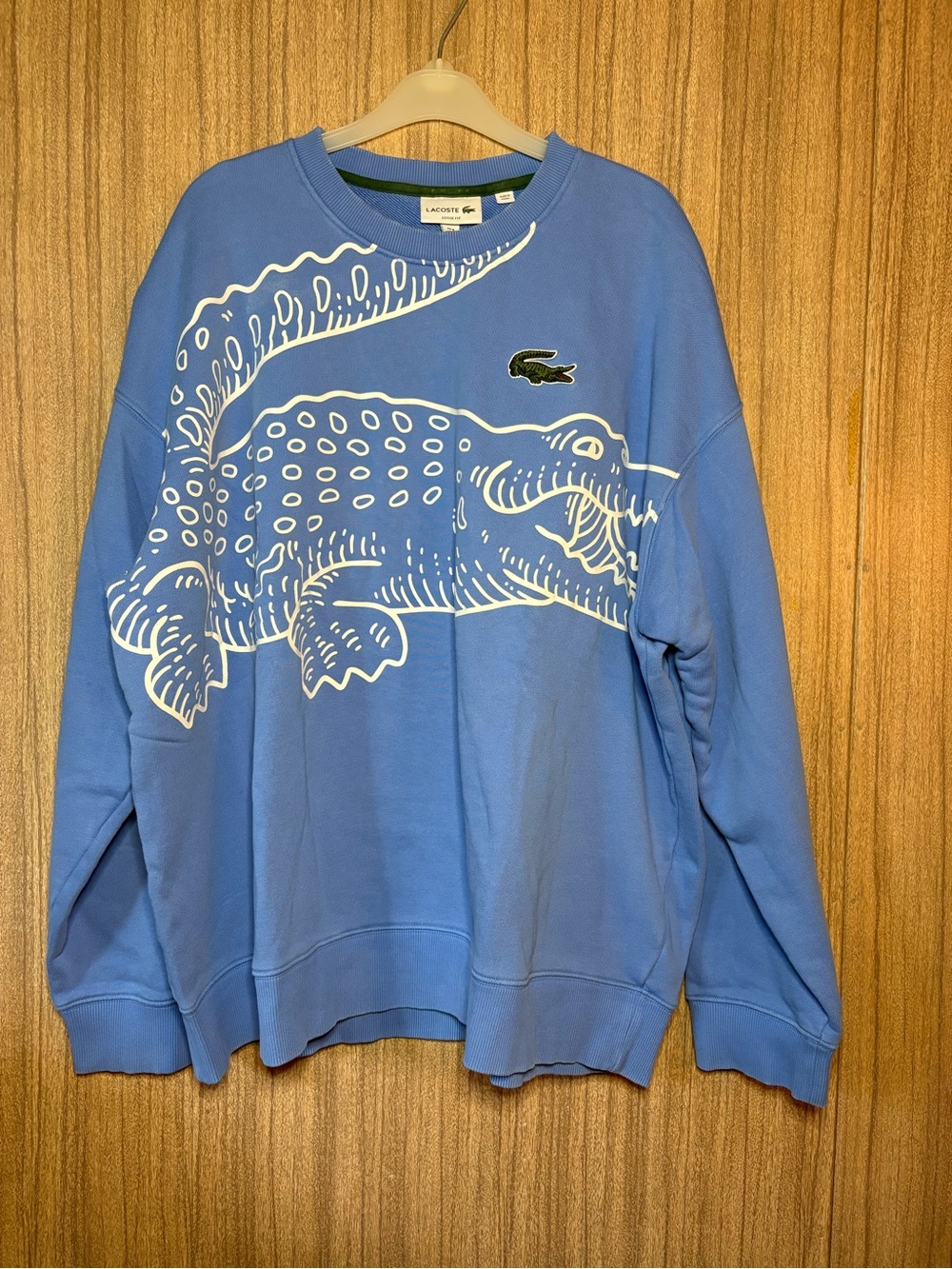 Lacoste Men’s Light Blue Crewneck Sweatshirt with White Crocodile Graphic